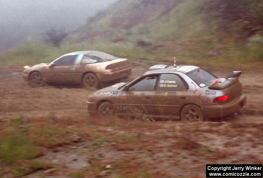 The John Cassidy / Dave Getchell Subaru Impreza passes the Amy BeberVanzo / Tim Sardelich Mitsubishi Eclipse on Del Sur 2.