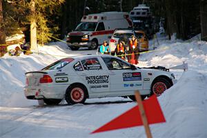 Steve Rowlands / Tessa Jordan BMW 330i spins on SS15, Agren-Hunters II.