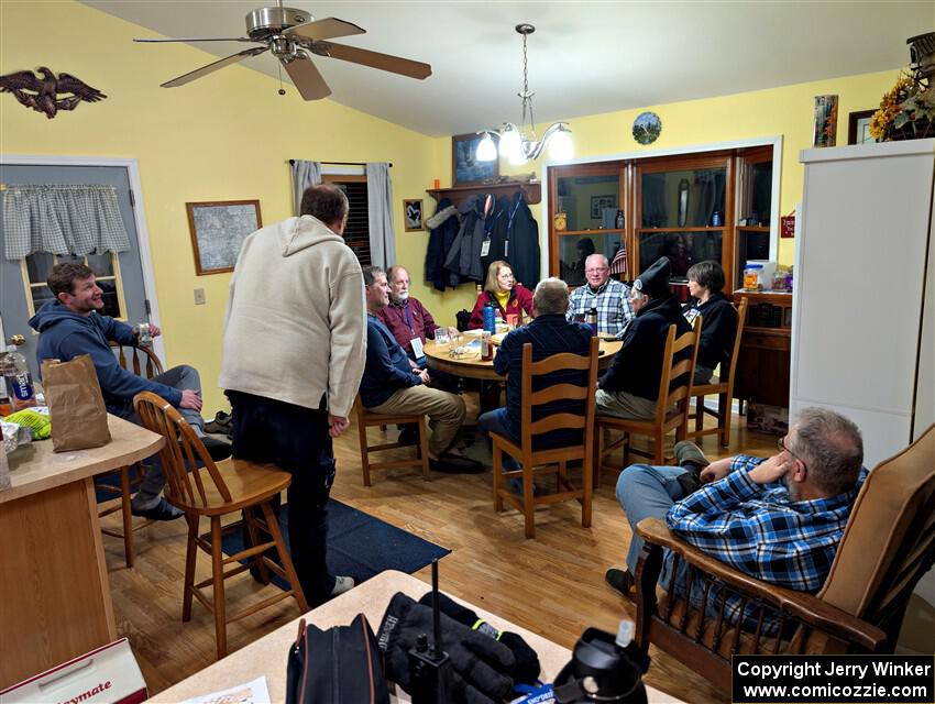 The rally crew relax at the rental house after the event.