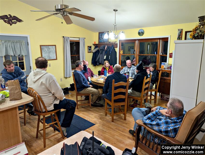 The rally crew relax at the rental house after the event.