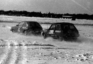 The Denny Popp / Adam Popp Plymouth Champ is chased by the John Dozier / Jeff Ruzich Renault LeCar.