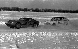 Scotty Bell's SAAB Sonnet II is chased by Don Roderick's Austin Mini Cooper S