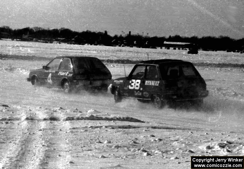 The Denny Popp / Adam Popp Plymouth Champ is chased by the John Dozier / Jeff Ruzich Renault LeCar.