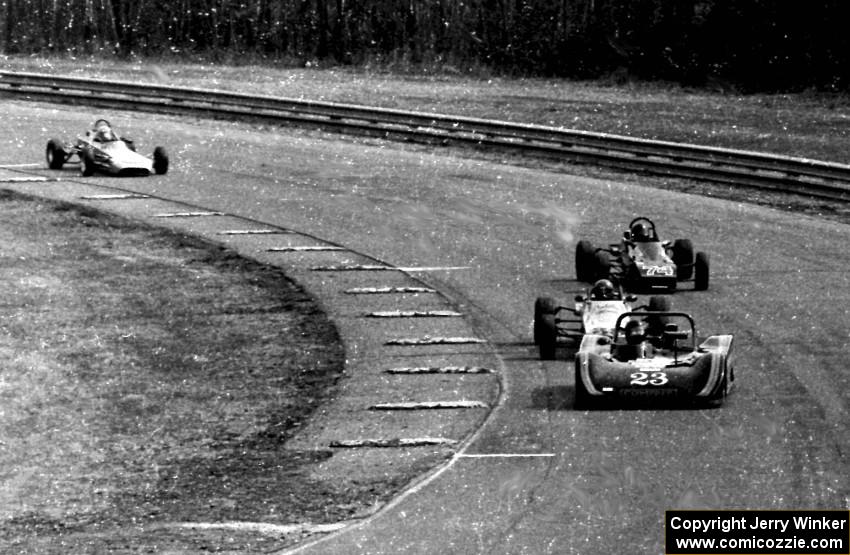 Cars stream through turn 9 during the race.