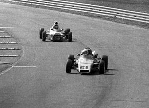 Phil Schrampfer's Merlyn Mk. 25 Formula Ford leads Rick Larsen's Lola T-440 Formula Ford through turn 9.