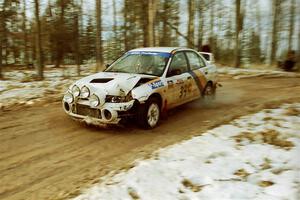 Pete Lahm / Frank Cunningham Mitsubishi Lancer Evo IV on SS2, Ranch I, shortly after hitting a tree.