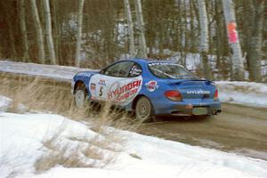 Mark Higgins / Michael Gibson Hyundai Tiburon limps through SS9, Camp 8, with a broken wheel.