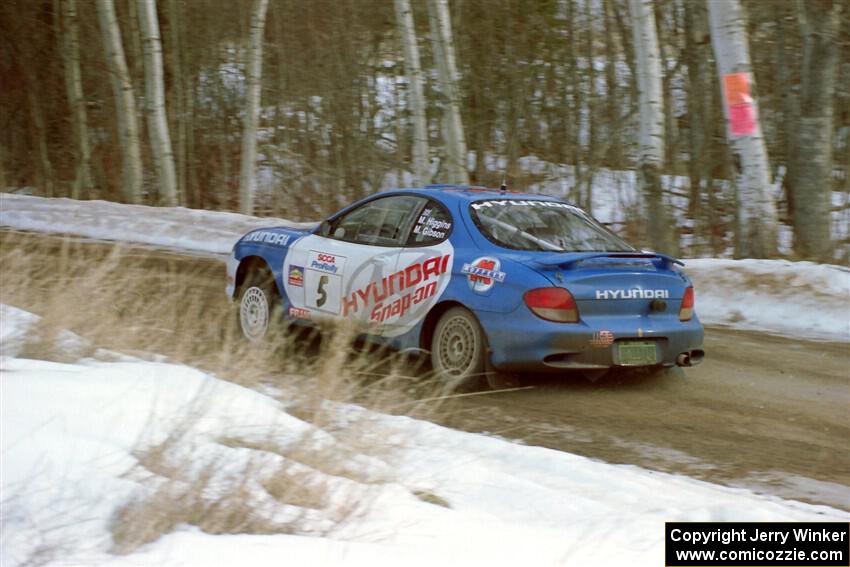 Mark Higgins / Michael Gibson Hyundai Tiburon limps through SS9, Camp 8, with a broken wheel.