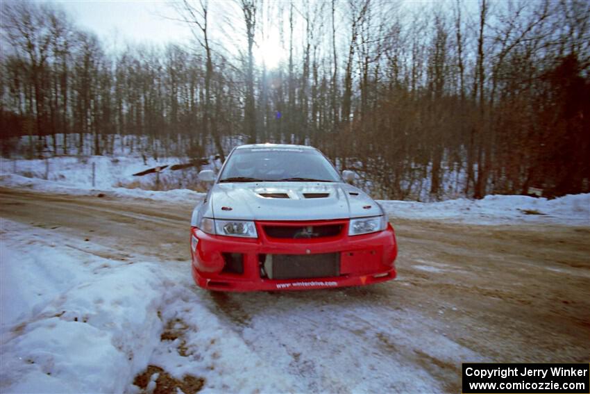 Mark Cox / Jim Gill Mitsubishi Lancer Evo VI on SS9, Camp 8.