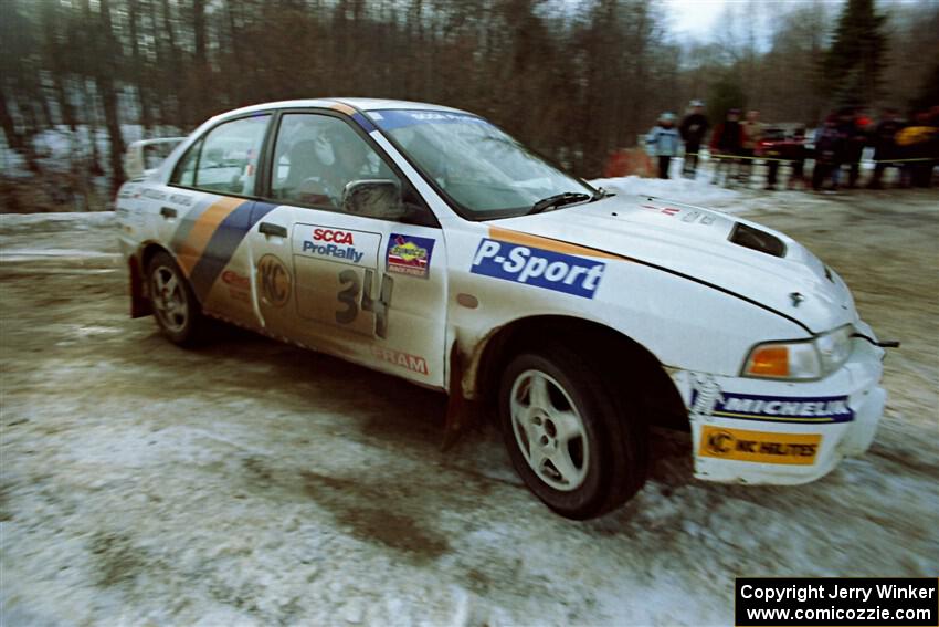 Pete Lahm / Frank Cunningham Mitsubishi Lancer Evo IV on SS9, Camp 8.