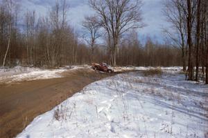 Jim Cox / Kaari Cox Chevy S-10 slides off into a snowbank on SS10, Camp 30.