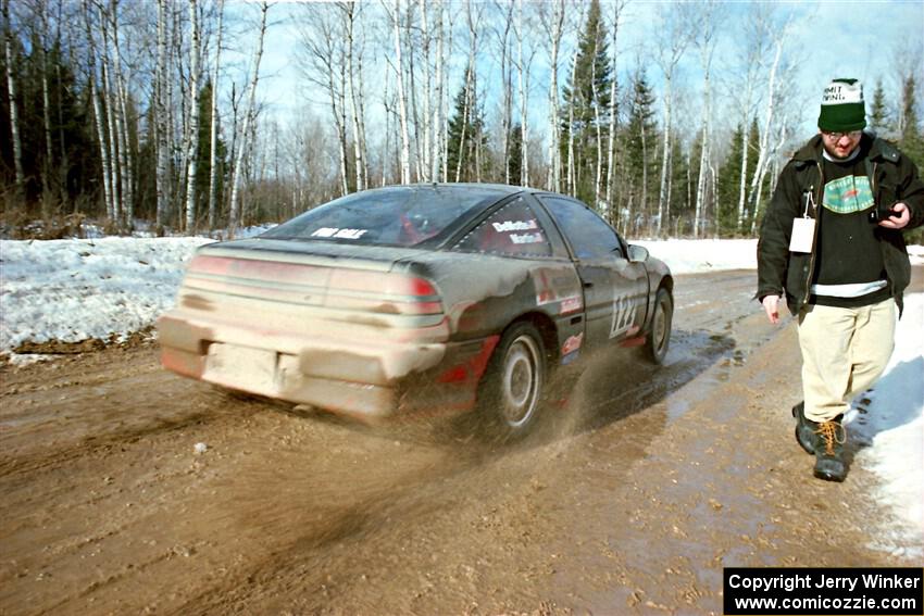Dennis Martin / Kim DeMotte Mitsubishi Eclipse GSX leaves the start of SS10, Camp 30.