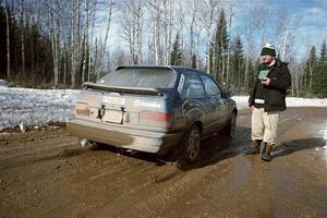 Andy Mohrlant / Chris Huntington Mazda 323GTX leaves the start of SS10, Camp 30.
