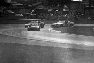 Paul Miller's Porsche 924 Carrera Turbo leads David Hobbs's Chevy Camaro and Joe Gonzalez's Chevy Camaro through turn 4