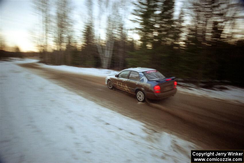 Eric Burmeister / Eric Adams Mazda Protege' MP3 on SS14, Meaford.