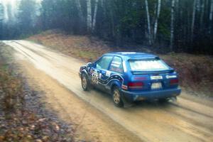 Chris Huntington / Andy Mohrlant Mazda 323GTX on SS1, East Steamboat.