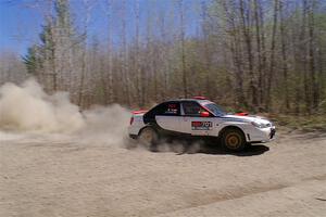 Jason Cook / Maggie Tu Subaru WRX on SS2, Kabekona I.