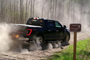 A Ford F-150 pickup sweeps SS4, Kabekona II.
