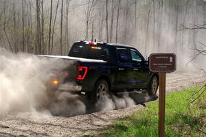 A Ford F-150 pickup sweeps SS4, Kabekona II.