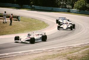 Tom Sneva's March 83C/Cosworth ahead of Desire Wilson's March 83C/Cosworth and Danny Ongais's March 83C/Cosworth