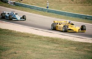 Al Unser, Sr.'s Penske PC11/Cosworth ahead of Danny Ongais's March 83C/Cosworth