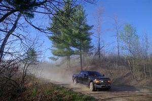 A Ford F-150 pickup sweeps SS6, Kabekona III.