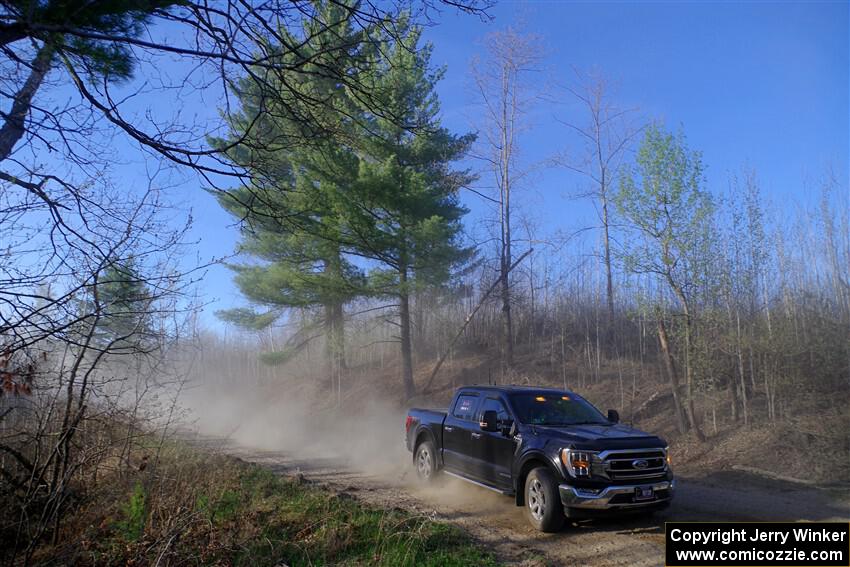 A Ford F-150 pickup sweeps SS6, Kabekona III.