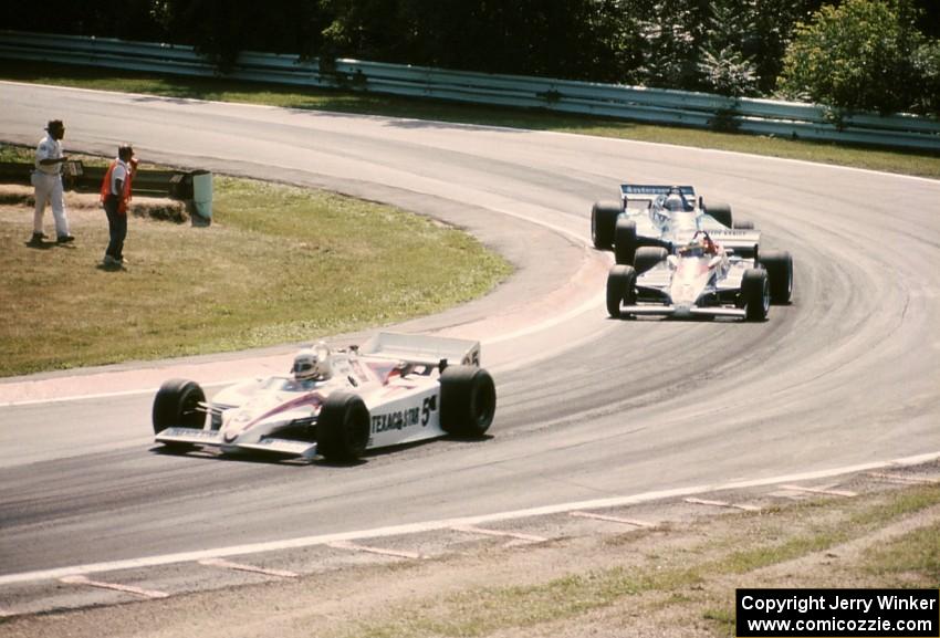 Tom Sneva's March 83C/Cosworth ahead of Desire Wilson's March 83C/Cosworth and Danny Ongais's March 83C/Cosworth