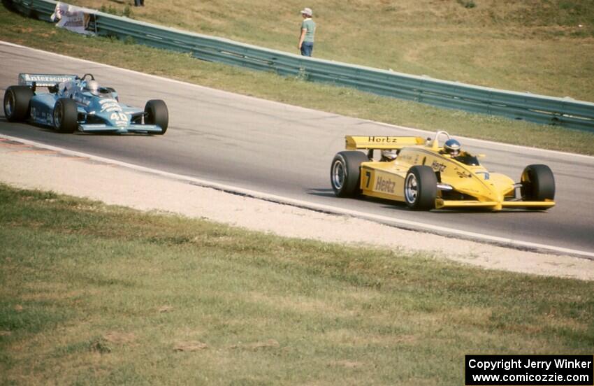 Al Unser, Sr.'s Penske PC11/Cosworth ahead of Danny Ongais's March 83C/Cosworth