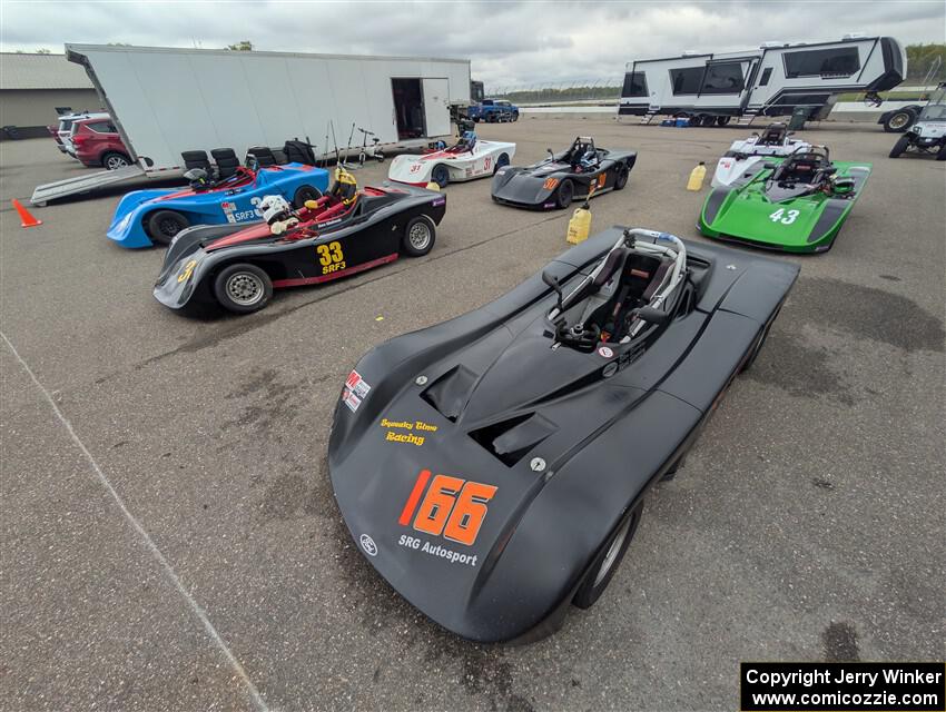A gaggle of Spec Racer Ford 3s paddocked together.