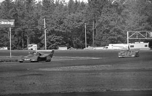 Rick DeJarld's Schkee leads Jerry Hansen's VDS-001/Chevy during the A Sports Racing battle.