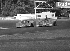 Jerry Hansen's VDS-001/Chevy does an outside pass in turn 10 on Rick DeJarld's Schkee during the A Sports Racing battle.