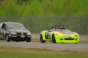 Geoff Youngdahl's F Production Mazda Miata and Tom Daly's STU VW Rabbit