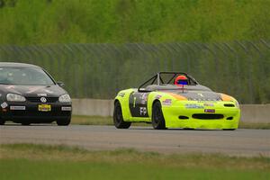 Geoff Youngdahl's F Production Mazda Miata and Tom Daly's STU VW Rabbit