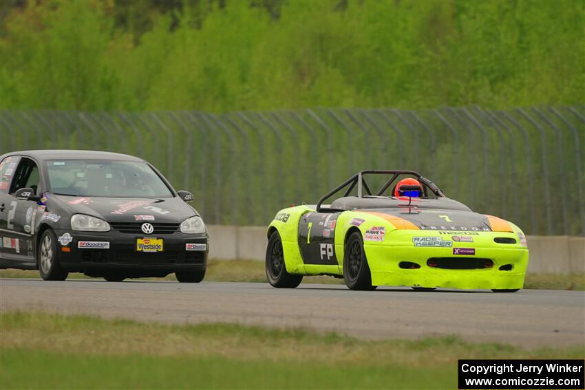 Geoff Youngdahl's F Production Mazda Miata and Tom Daly's STU VW Rabbit