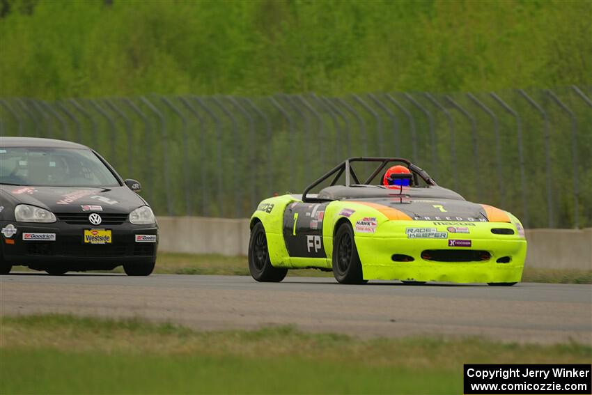 Geoff Youngdahl's F Production Mazda Miata and Tom Daly's STU VW Rabbit