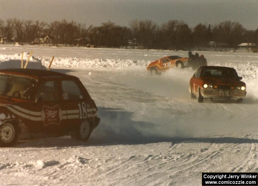 Rich Morrison's Renault LeCar and Marianne Matthews / Bob Coatsworth Mercury Capri go by as Tom Schramm's Lotus Europa gets free