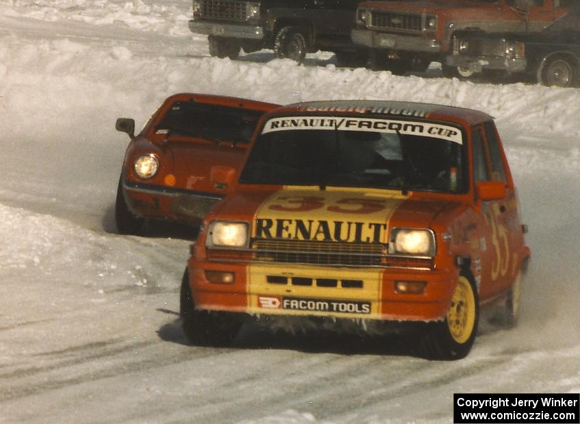 Jerry Orr's Renault LeCar leads Tom Schramm's Lotus Europa through the final corner