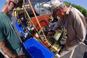 Dave Helgeson's 1908 Buick gets the oil topped off in Buffalo.
