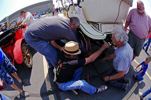 Ned Protexter's 1907 Brasier gets a tire change in Buffalo.