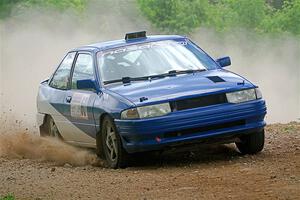 Jacob Kennedy / Josh Remmetter Ford Escort GT on SS1, Camp 3 North.