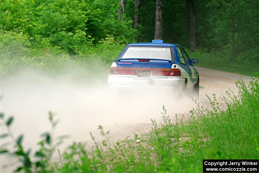Jacob Kennedy / Josh Remmetter Ford Escort GT on SS1, Camp 3 North.