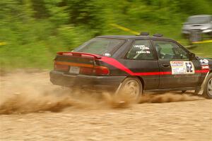 Joe Boburka / Elizabeth Unglenieks-Ploeg Ford Escort on SS3, Woodtick Hollow.