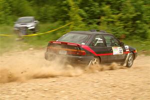 Joe Boburka / Elizabeth Unglenieks-Ploeg Ford Escort on SS3, Woodtick Hollow.