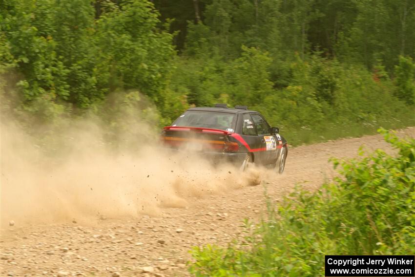 Joe Boburka / Elizabeth Unglenieks-Ploeg Ford Escort on SS3, Woodtick Hollow.