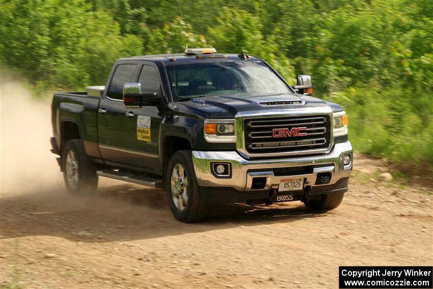 A GMC Sierra pickup sweeps SS4, Hollow Woodtick.