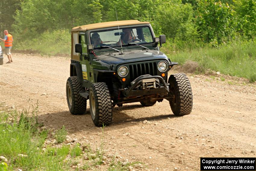 A Jeep Wrangler sweeps SS4, Hollow Woodtick.