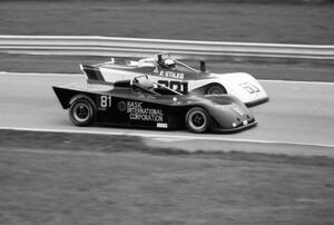 John Drane's Tiga SC80 passes Peter Stiles's Tiga SC84 during Sports 2000 qualifying.