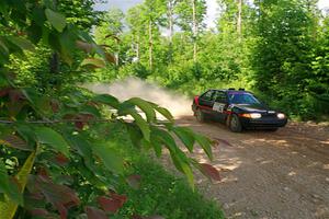 Joe Boburka / Elizabeth Unglenieks-Ploeg Ford Escort on SS5, Chainsaw Junksin.