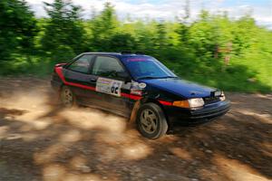 Joe Boburka / Elizabeth Unglenieks-Ploeg Ford Escort on SS5, Chainsaw Junksin.